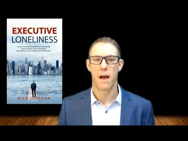 Nick Jonsson giving a keynote on executive loneliness